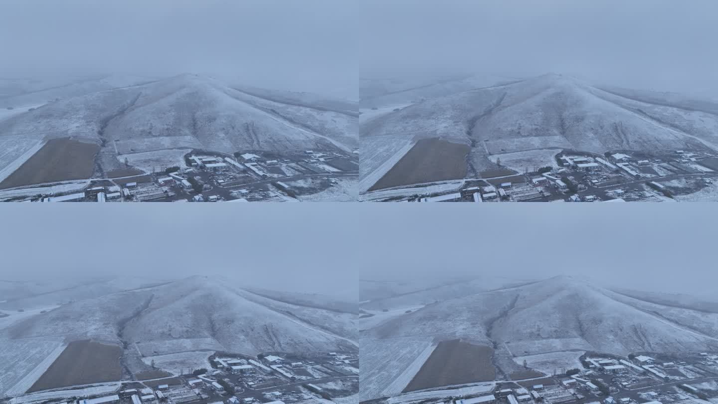 航拍风雪交加的山村