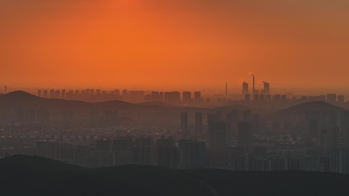 日出日落工厂炊烟袅袅大气环境污染