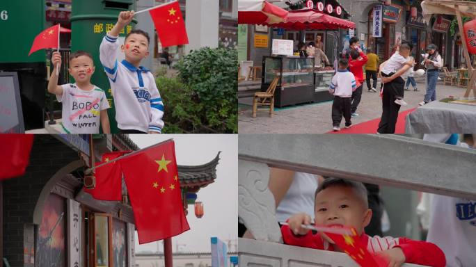 国庆氛围街头小学生手持国旗庆祝祖国生日