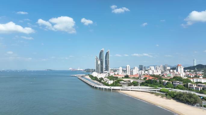 厦门海岸线风光航拍海边城市双子塔建筑风景