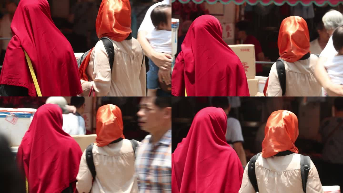 两个带红头巾的女人