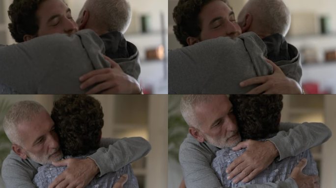年幼的儿子满怀爱意地拥抱着父亲