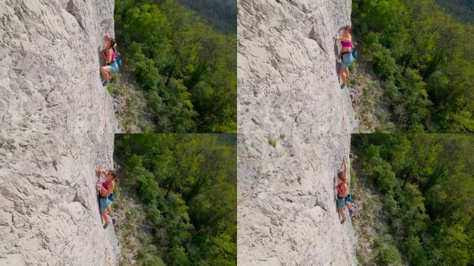 特写:运动女子在攀爬岩壁的同时，在快划中夹紧保护绳