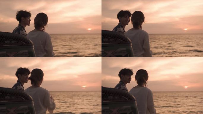 一对相爱的情侣在面包车上欣赏美丽的日落海景。