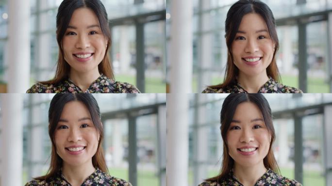 快乐，微笑和亚洲女商人的面孔在办公室与积极，良好和自信的态度。现代职场中日本年轻女设计师的幸福、事业
