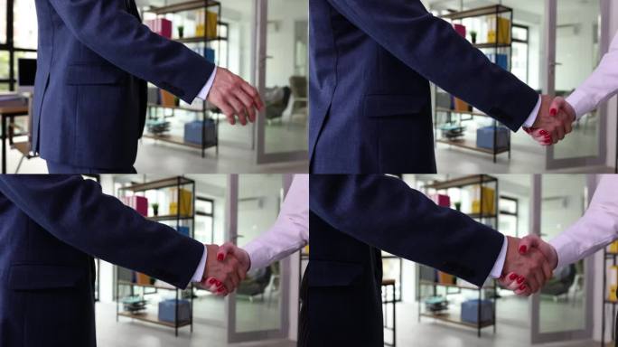 男性的手和成功的企业伙伴关系与女性打交道
