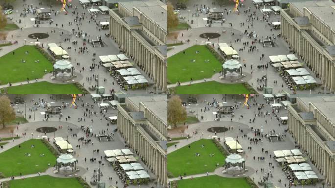 白天斯图加特市中心拥挤的行人广场航拍全景4k德国