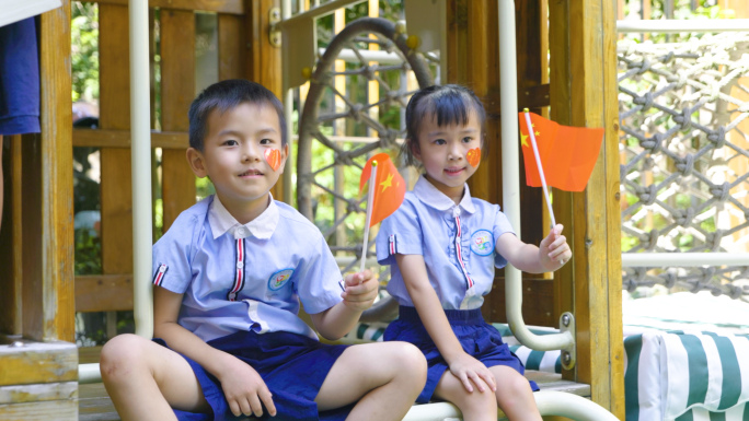 国庆节中国梦小孩摇红旗祝福祖国儿童节