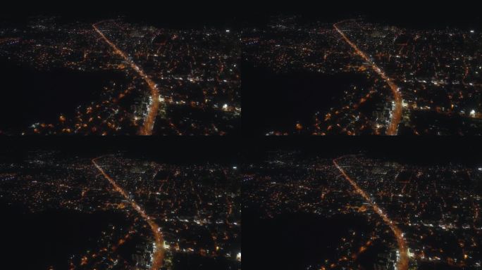 夜间城市灯光无人机视图。夜生活住宅区，航拍画面。
