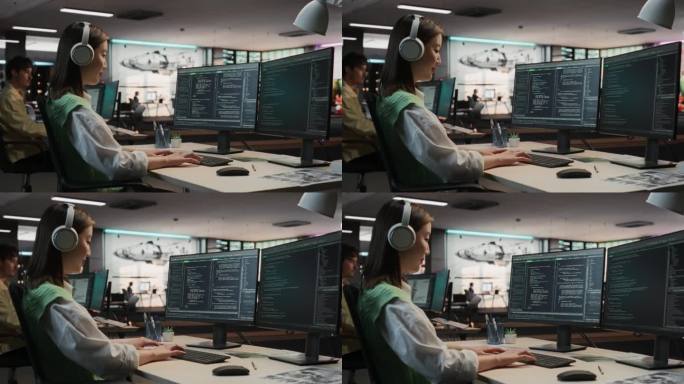 亚洲女性游戏程序员在游戏设计工作室的桌面电脑上编程。戴着耳机的女人在写代码。新沉浸式3D生存视频游戏