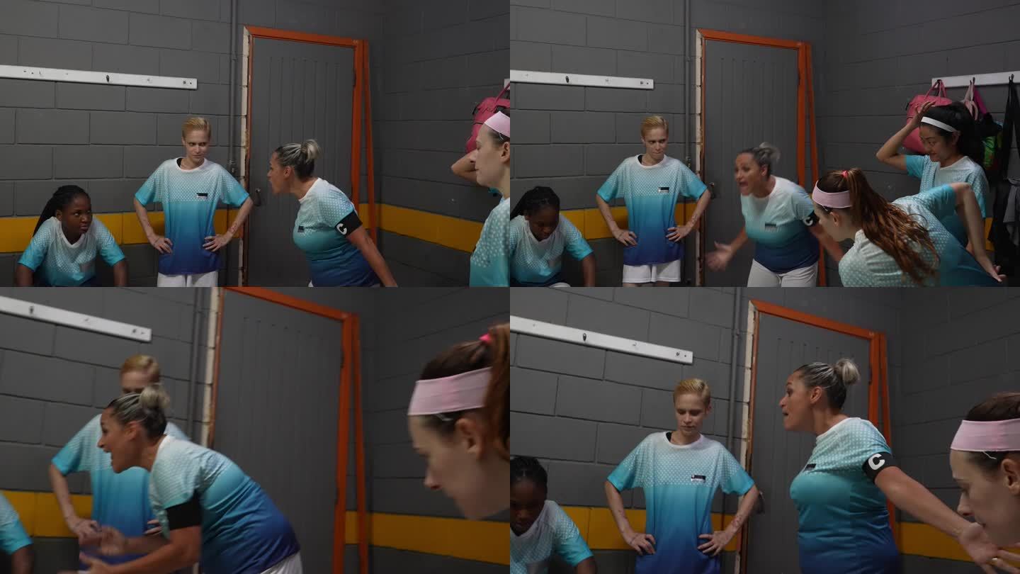 愤怒的女足球队队长在更衣室和队友交谈