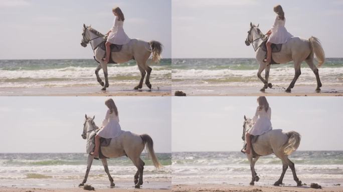 穿白衣的女孩在海边骑马