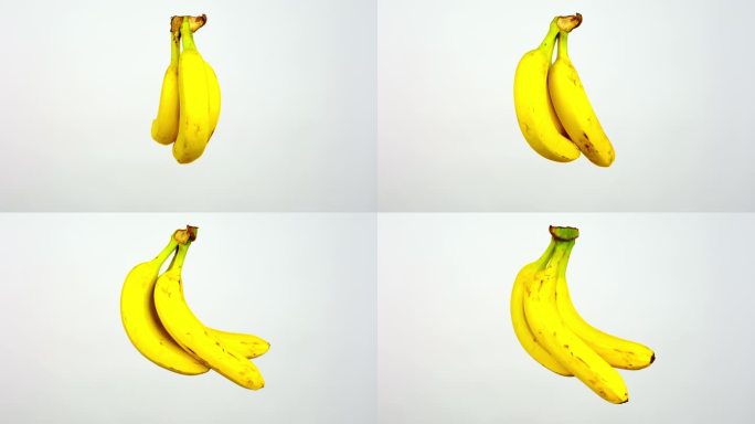 在旋转运动中移动香蕉。白色背景。