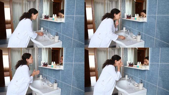 中年孕妇，穿着白色华夫格浴袍，涂洗面奶洗脸