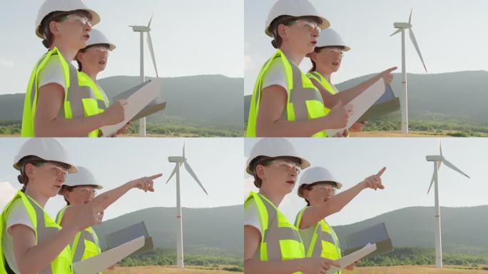 设计师制定计划安装新的风车清洁发电。能源专家以风力发电机为环保能源。女工程工人检查、分析