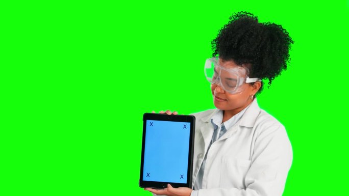 女人，科学家和平板电脑，绿色屏幕上有跟踪标记，用来在工作室背景下做广告。女医学科普专家远程医疗模型技