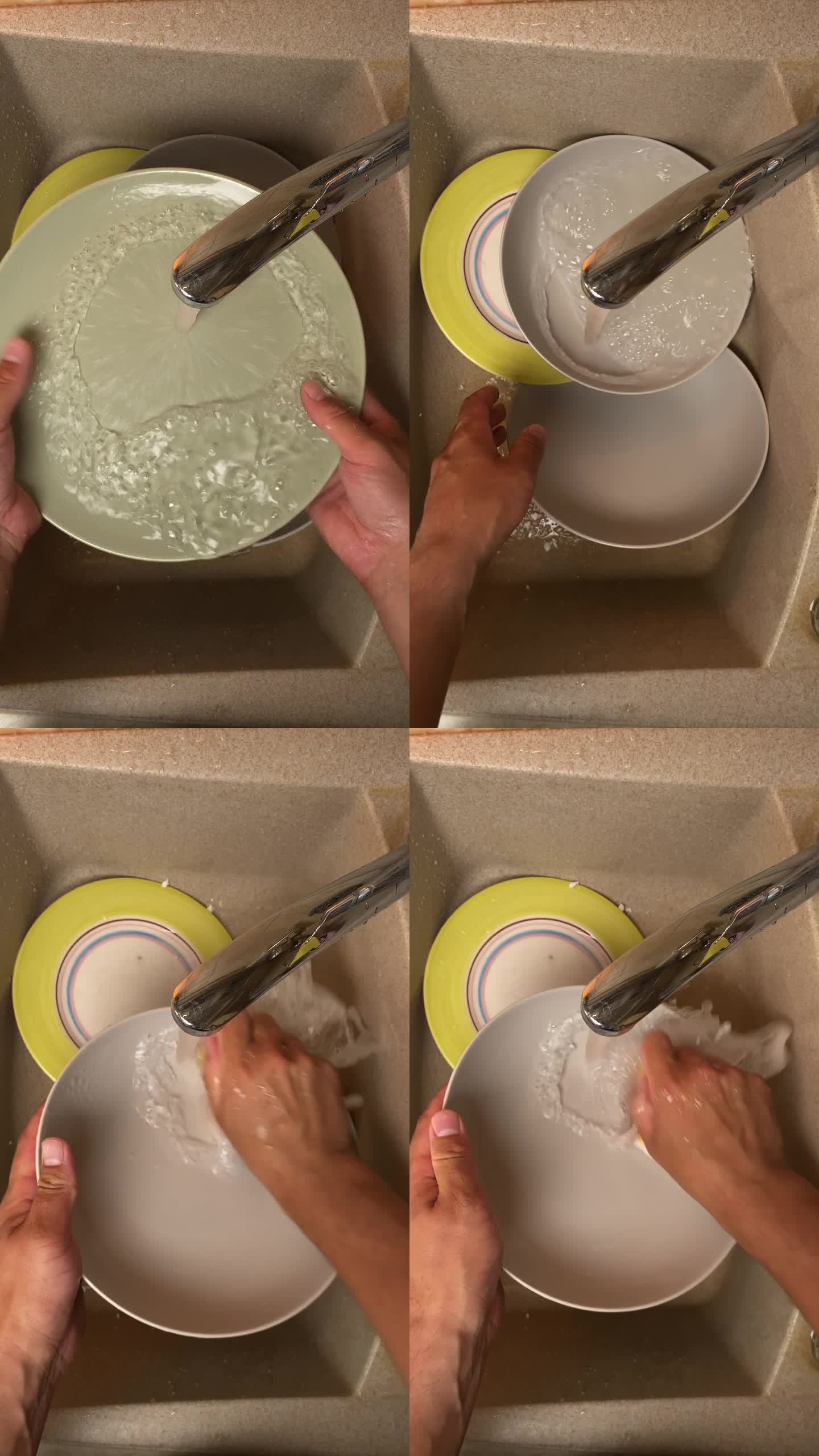 在水槽里用海绵和洗洁精垂直洗碗