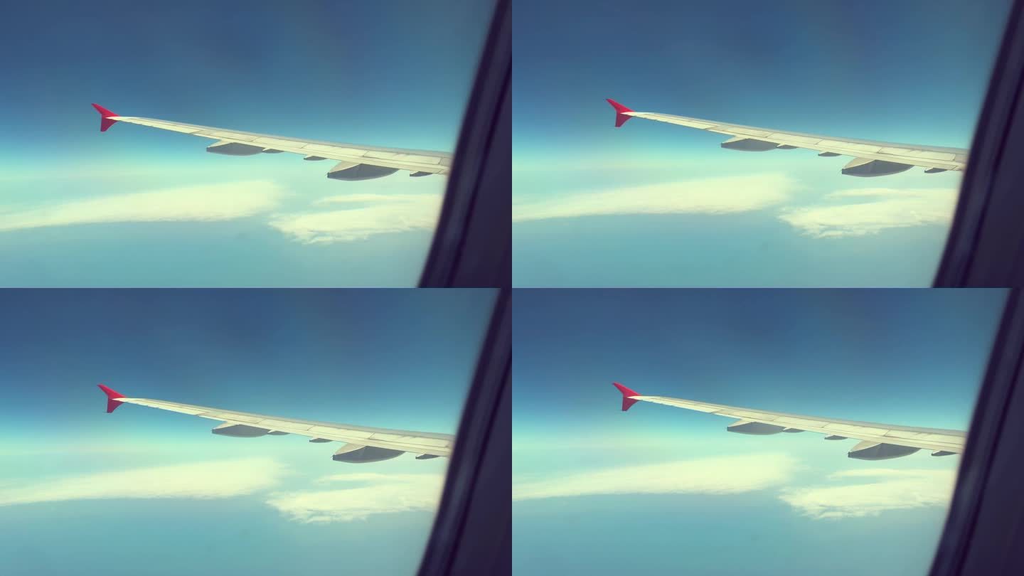 天空中飞机的侧翼视图，云层，黑海，土耳其