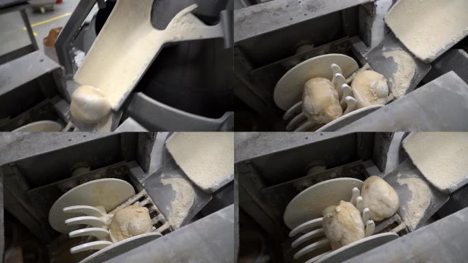 新鲜面团在工业烘焙线-慢动作视频