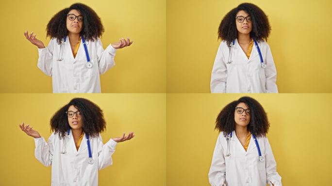 非裔美国女医生站在孤立的黄色背景上毫无头绪