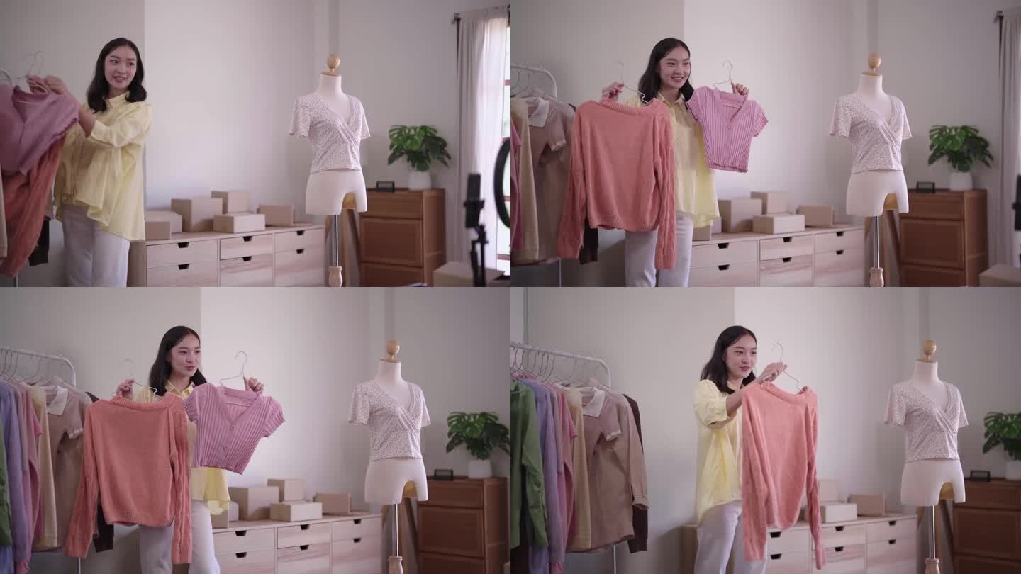 年轻的亚洲女士时装展示二手服装产品呈现细节录制视频直播在家办公室创业小企业企业家中小企业电话营销仓库