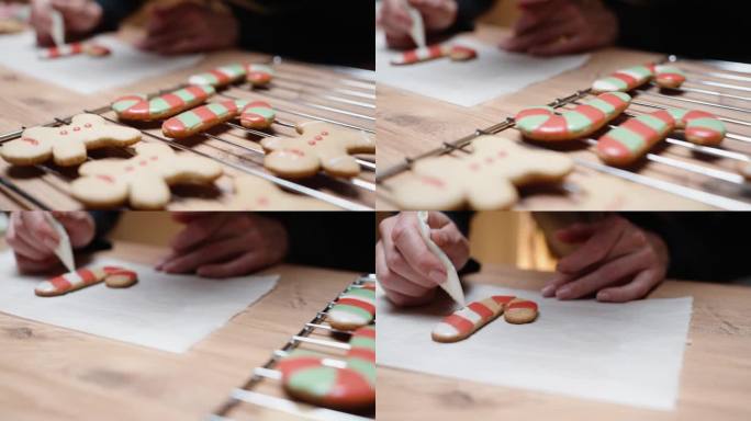 自制的姜饼饼干做成了棒棒糖和小人的形状，并用糖霜装饰。