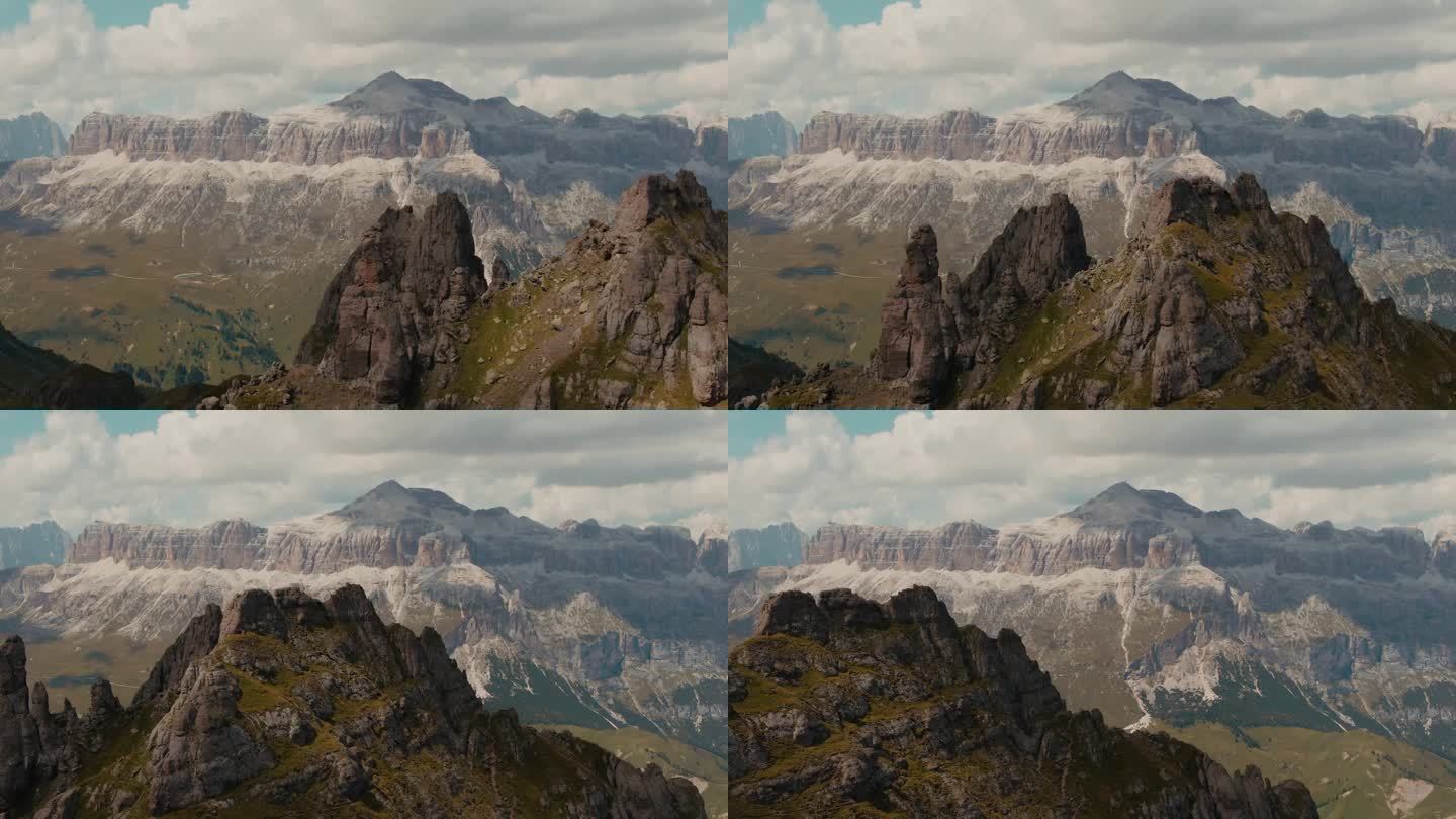 夏天在山上，度假和度假在阿尔卑斯山。空中近距离拍摄美丽陡峭的白云石山脉。户外探险。电影色彩等级