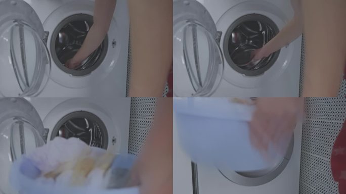 家庭主妇从洗衣机里取出洗好的衣服