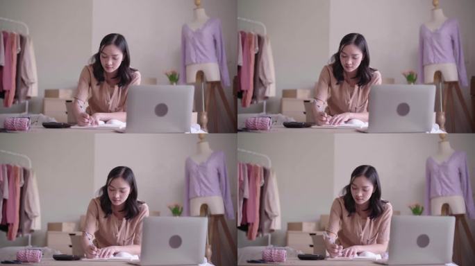 年轻的亚洲女企业家使用计算器计算销售产品的金融价格，中小企业在线业务。