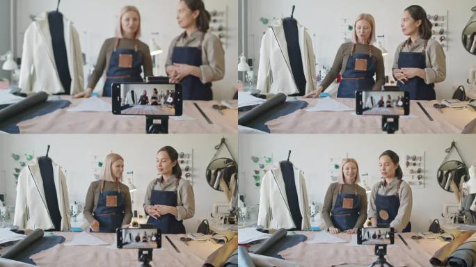 两位女裁缝在工作室录制社交媒体视频内容