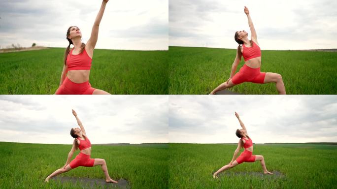 穿着橙色服装的运动女子在绿色清新的田野里练习瑜伽，极简主义的场景。用腿和胳膊做伸展体式。健康生活方式