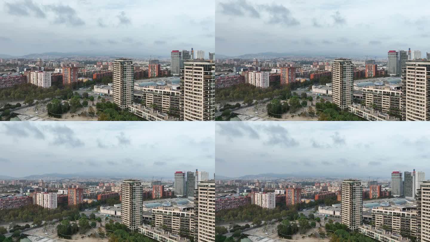 多云天巴塞罗那城市景观航拍全景4k西班牙