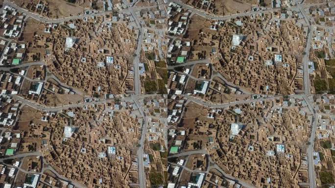 粘土土坯泥砖历史悠久的古代传统建筑设计房屋紧密相连的沙漠城市阿克达在亚兹德中东旅游景点像摩洛哥瓦尔扎