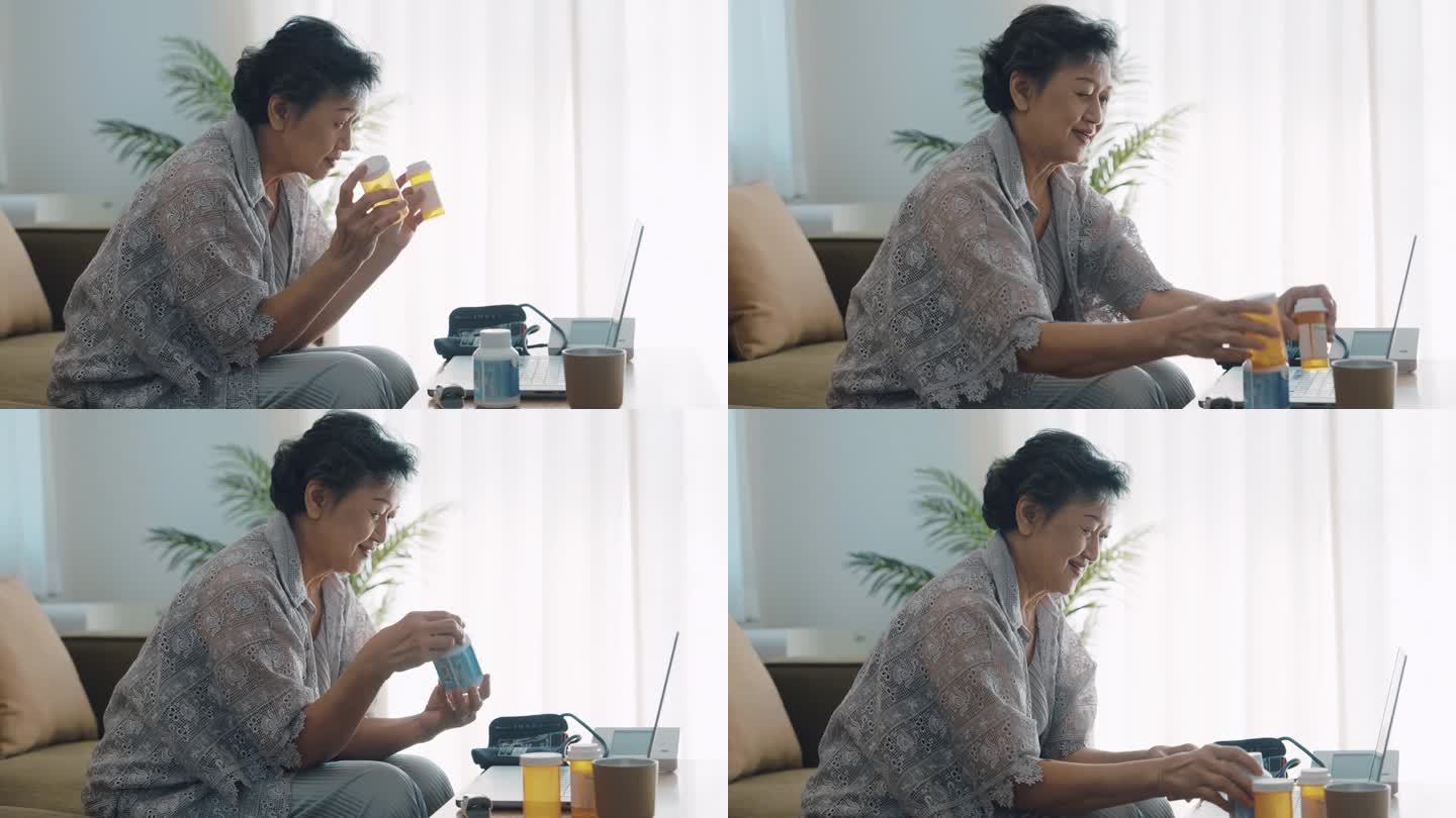亚洲老年妇女在客厅使用电脑，向医生询问有关药物的问题。
