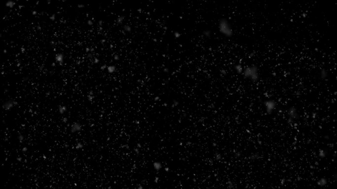 雪现实落在黑色背景。雪落在黑色的背景上。