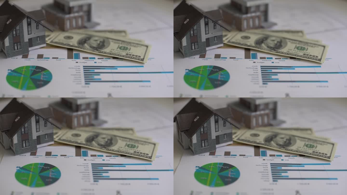 房屋模型印在100美元钞票上。把钱或投资存起来盖新房子