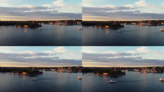 格罗纳隆德的美丽景色，这是斯德哥尔摩的一个游乐园，日落时分，通勤船驶向市中心。