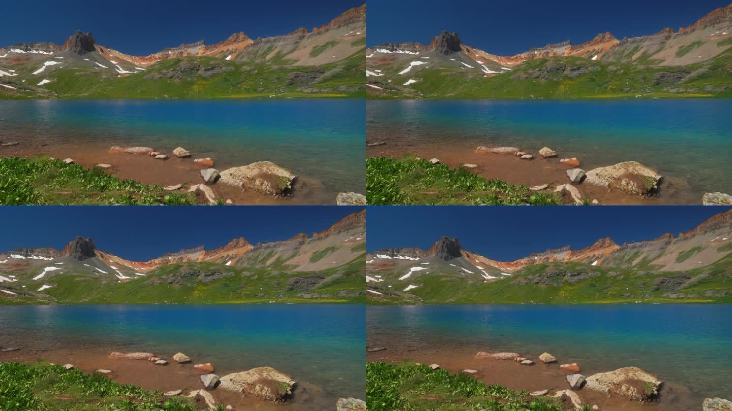 科罗拉多冰湖盆地小径低令人惊叹的明亮的蓝色高山清澈的水夏天蓝天落基山雪山山峰西尔弗顿特柳赖德梦幻宁静