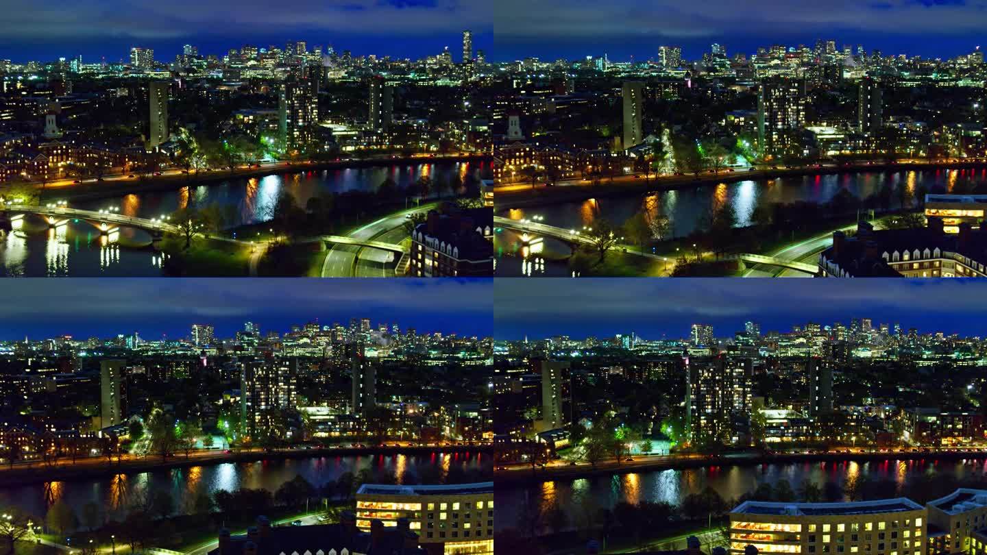 剑桥，麻萨诸塞州夜晚与波士顿天际线背景-航拍