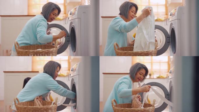 亚洲老年妇女和女儿把脏衣服放进洗衣机。有吸引力的成熟管家清洁，感觉很高兴在家里的洗衣机设备装载衣物。