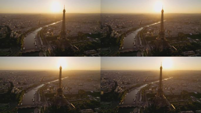 埃菲尔铁塔和塞纳河的鸟瞰图，背景是日出时的法国巴黎。电影4 k。