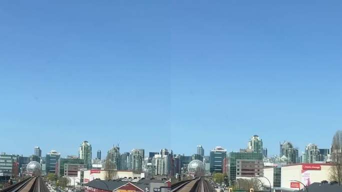 温哥华轻轨新加拿大线到萨里家轨道列车空中列车公路旅行交通大城市生活方便舒适蓝天好天气各种专业品质的视