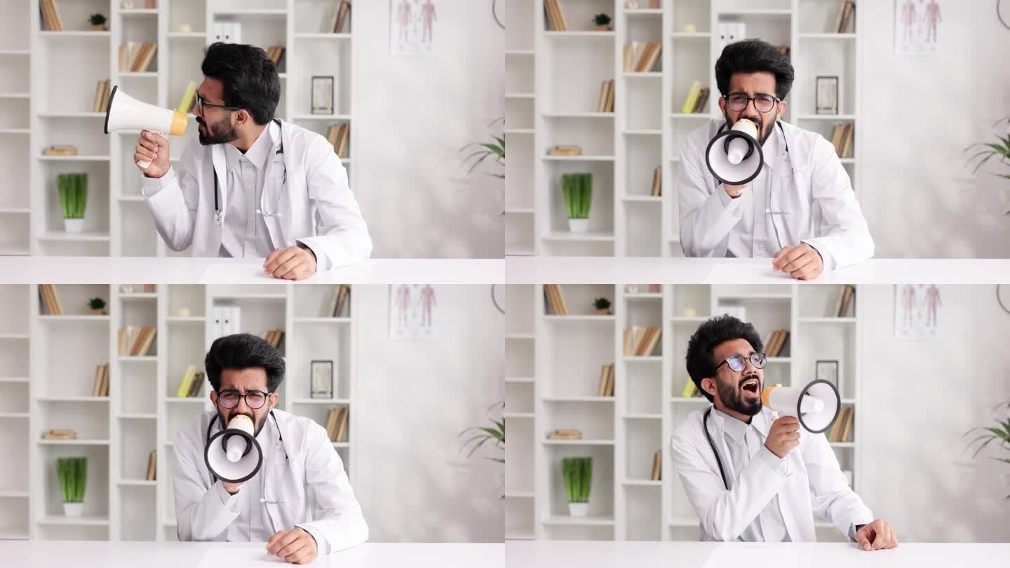 一位身穿白大褂的印度男医生拿着一个扩音器，在办公桌前对着扩音器大喊大叫。对情绪的夸张，对危险疾病的警