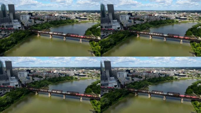 无人机拍摄的火车在桥上过河的中景