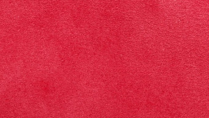 特写红色纹理织物布料，纺织品背景。从左到右的运动。