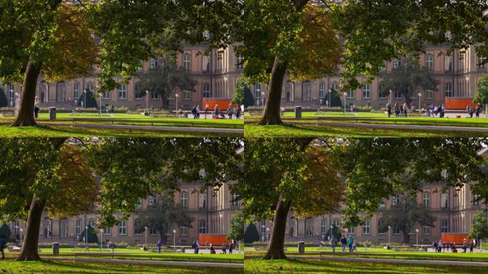 阳光明媚的日子，斯图加特市中心公园人头攒动，全景4k延时拍摄德国