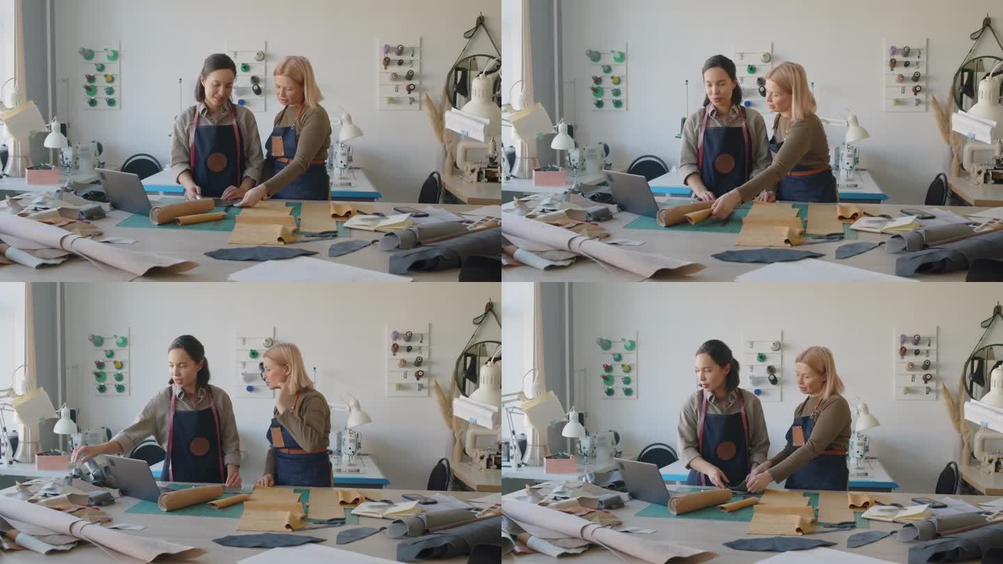 两个女裁缝在皮革工作室工作的新设计