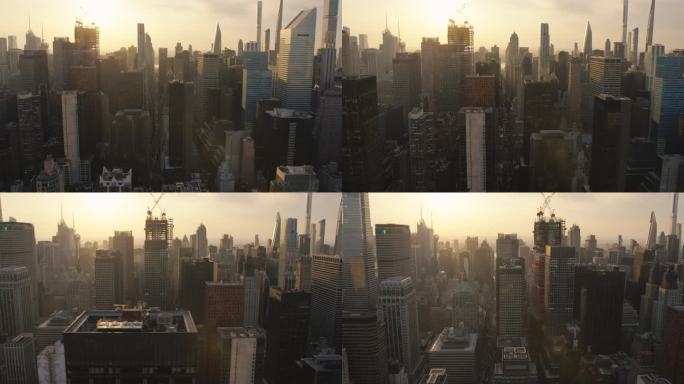 美丽的电影空中日落镜头纽约市摩天大楼和繁忙的城市街道与汽车交通。曼哈顿下城办公大楼和城市环境的全景直