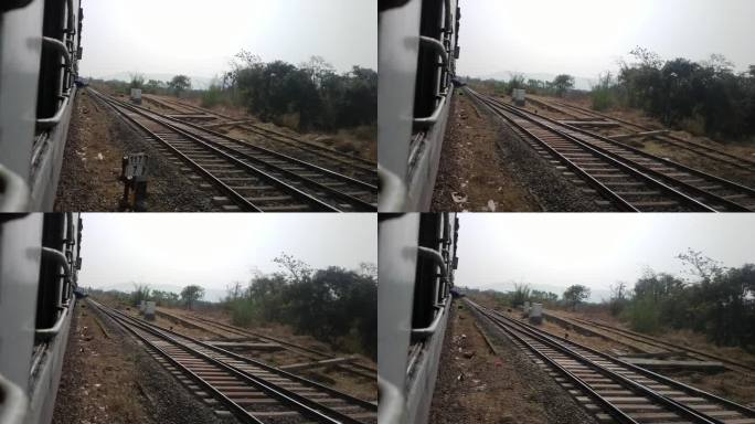 10.印度铁路从转弯轨道上最后一辆车的窗户拍的