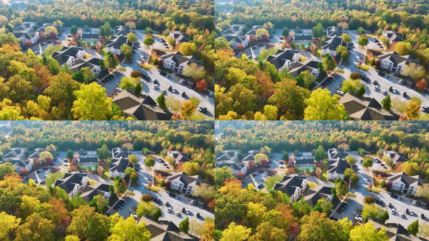 秋天南卡罗来纳郊区黄树之间的新公寓鸟瞰图。美国郊区的房地产开发